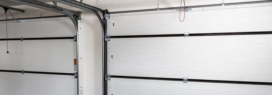 Fix Folding Garage Door Jerking in Orland Park, Illinois